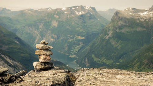 Stack of stones on the top of a mountain