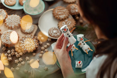 High angle view of christmas ornaments on table