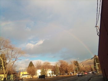 View of rainbow over city