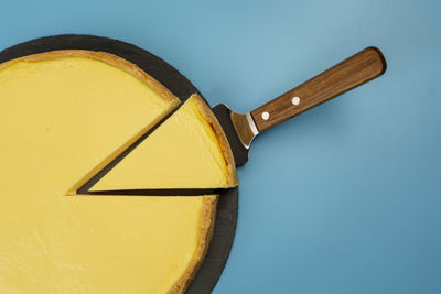 High angle view of equipment on blue background