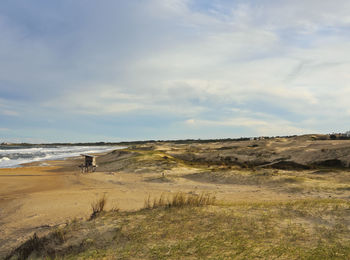 Scenic view of beach against sky