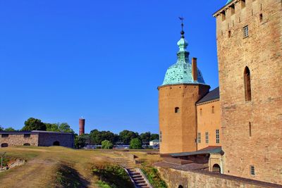 View of historic building against blue sky