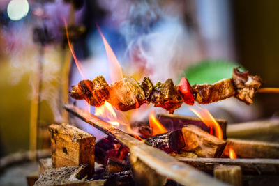 Close-up of bonfire on barbecue grill pork meat - a traditional ethnic food item