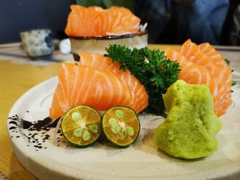 Close-up of fish served on table