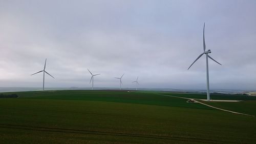 Wind turbines on field