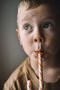 Portrait of cute boy looking away