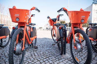 Bicycles parked on street in city