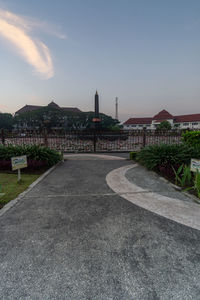 View of mosque against sky in city