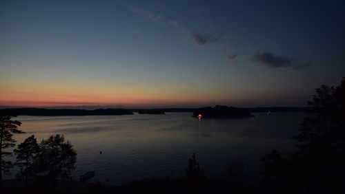 Scenic view of lake during sunset