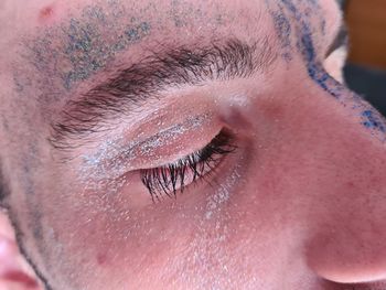 Extreme close-up of woman with eyes closed