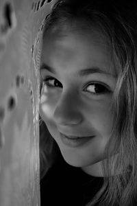 Close-up portrait of smiling girl