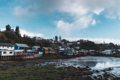 Palafitos stilted houses in castro on chiloe in chile at low tide