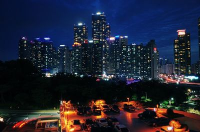 Illuminated buildings in city at night