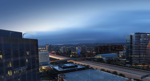 City skyline against blue sky