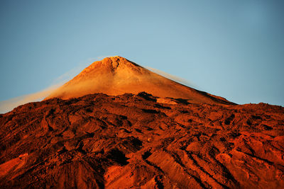 Scenic view of rocky mountain at el teide national park against clear sky