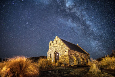 Historic building against sky at night