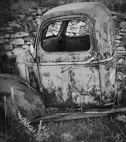 Close-up of abandoned car