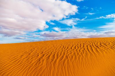 Scenic view of desert against sky