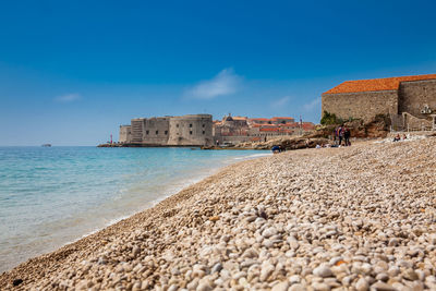 The beautiful banje beach and dubrovnik city