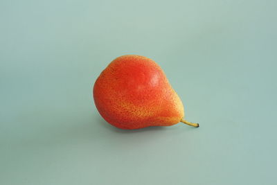 Close-up of fruit against white background