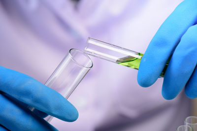 Close-up of scientist working at laboratory