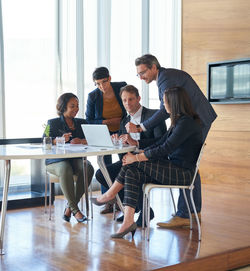 Business colleagues working at office