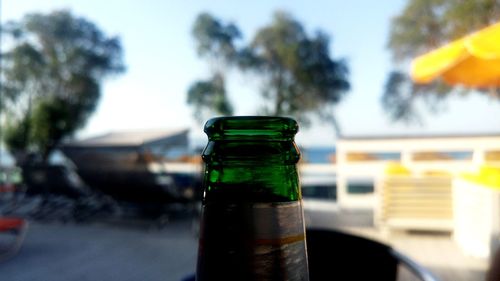 Close-up of wine bottles on table