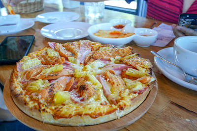 High angle view of pizza on table