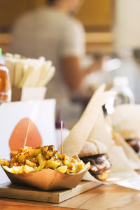 Close-up of serving food on table