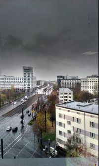 City street against cloudy sky