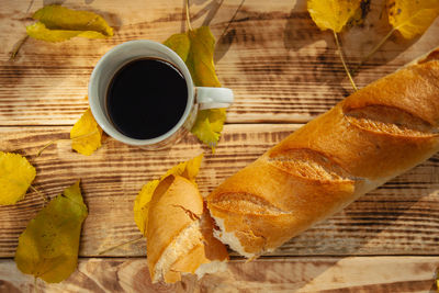 High angle view of coffee served on table