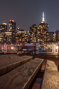 Illuminated buildings in city at night