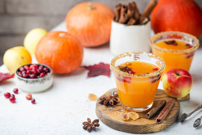 Close-up of juice and drink on table