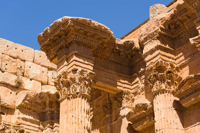 Low angle view of old temple against sky