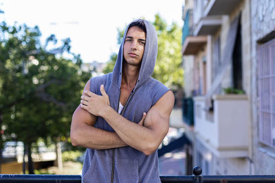 Portrait of young man standing