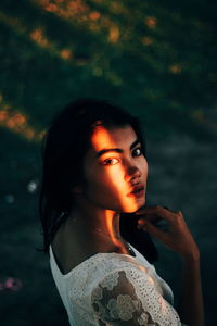 Portrait of young woman looking away