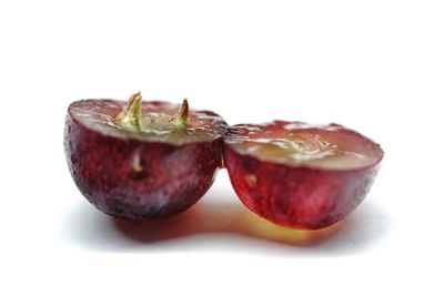 Close-up of fruits against white background