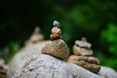 Close-up of stone stack on rock