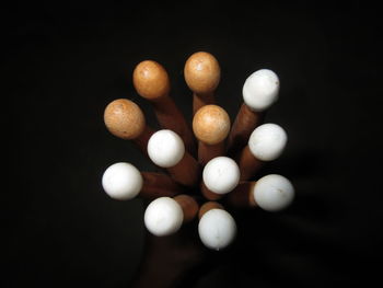 High angle view of candies against black background