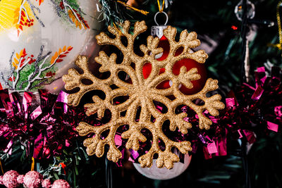 Close-up of christmas decorations hanging in market