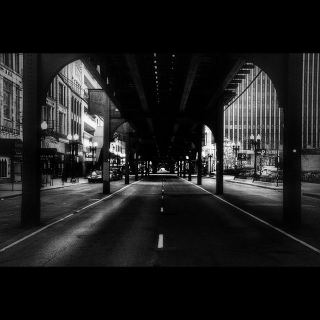 architecture, built structure, the way forward, building exterior, transportation, city, diminishing perspective, indoors, incidental people, road, empty, street, vanishing point, architectural column, building, road marking, city life, long, car, day