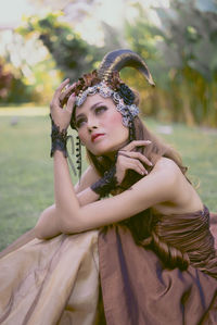 Portrait of young woman wearing traditional clothing