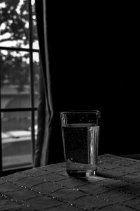 Glass of water on table