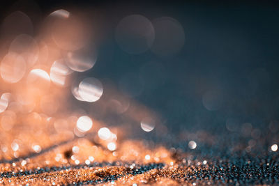 Defocused image of illuminated lights at night