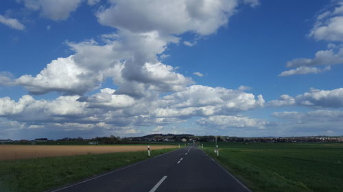 Road passing through field