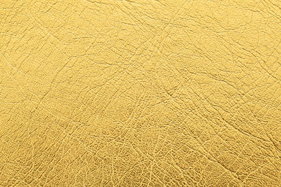 Close up shot of gold leather texture background