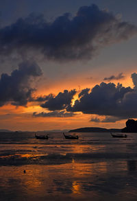 Scenic view of sea at sunset
