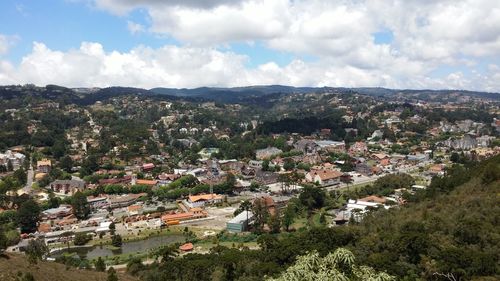 High angle view of houses and trees in town