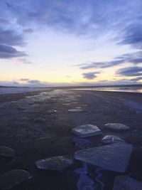 Scenic view of sea at sunset