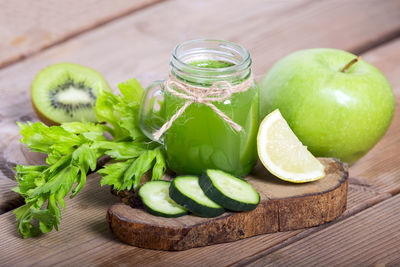 Close-up of green fruits on table